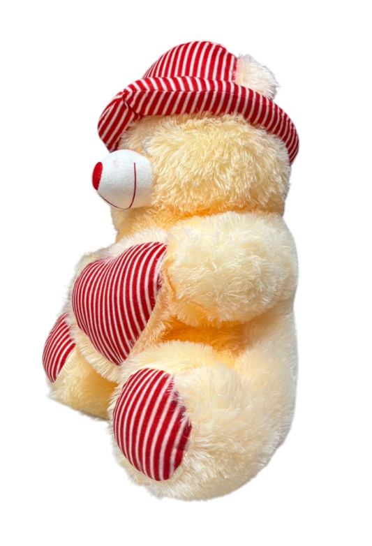 red and white printed taddy bear